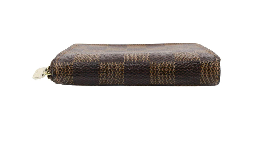 Louis Vuitton Damier Ebene Zippy Wallet.