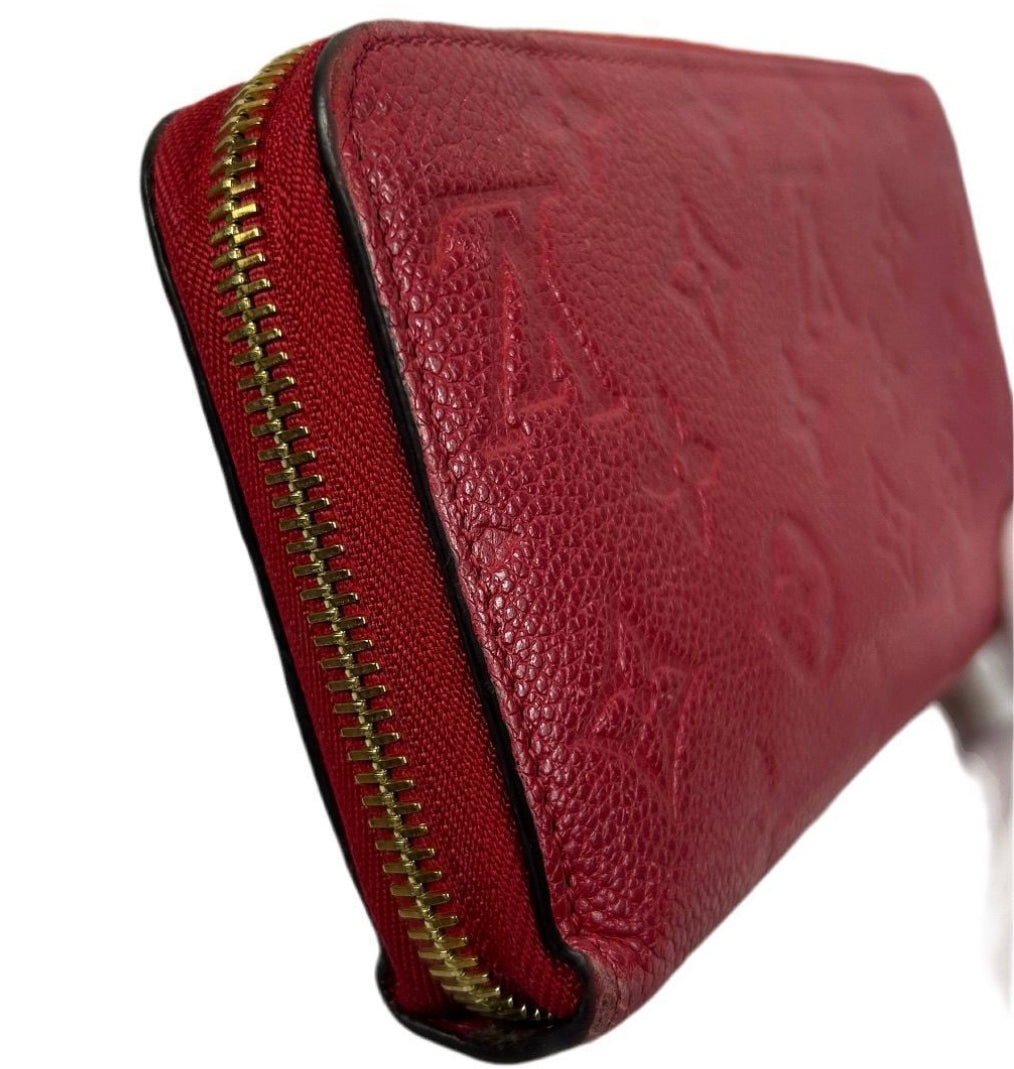 Louis Vuitton Monogram Empreinte Leather Zippy Wallet.