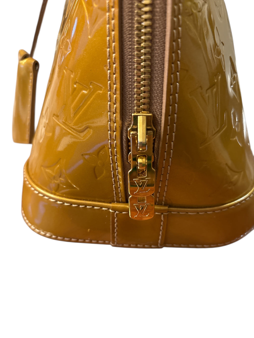 Louis Vuitton Monogram Vernis Alma Gold Hand Bags.