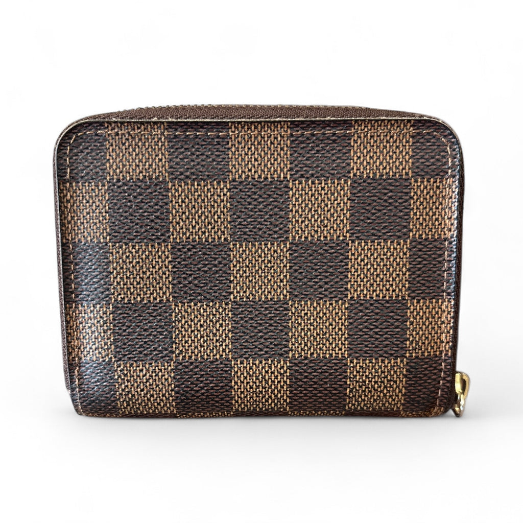 Louis Vuitton Damier Ebene Zippy Wallet.
