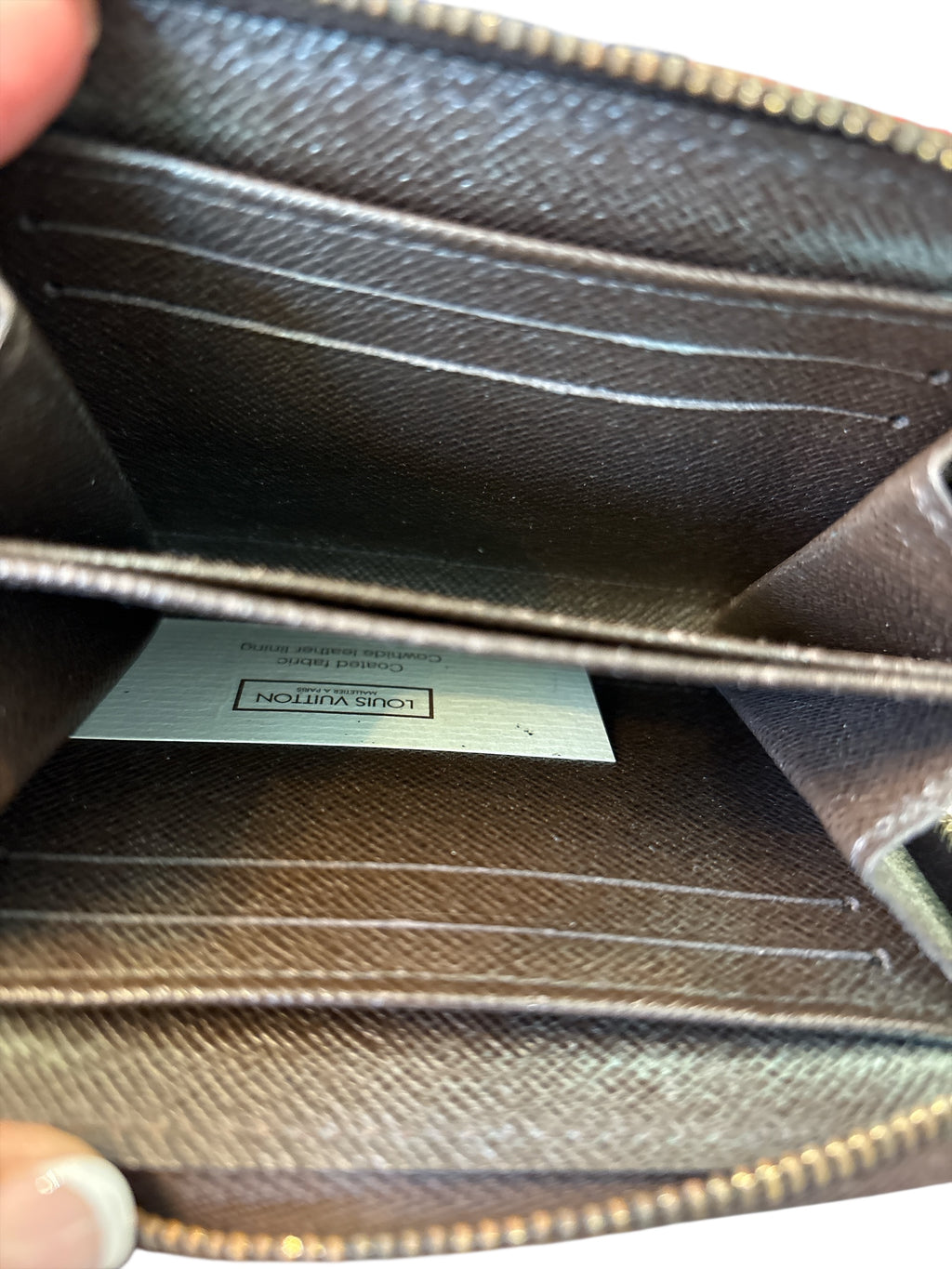 Louis Vuitton Damier Ebene Zippy Wallet.