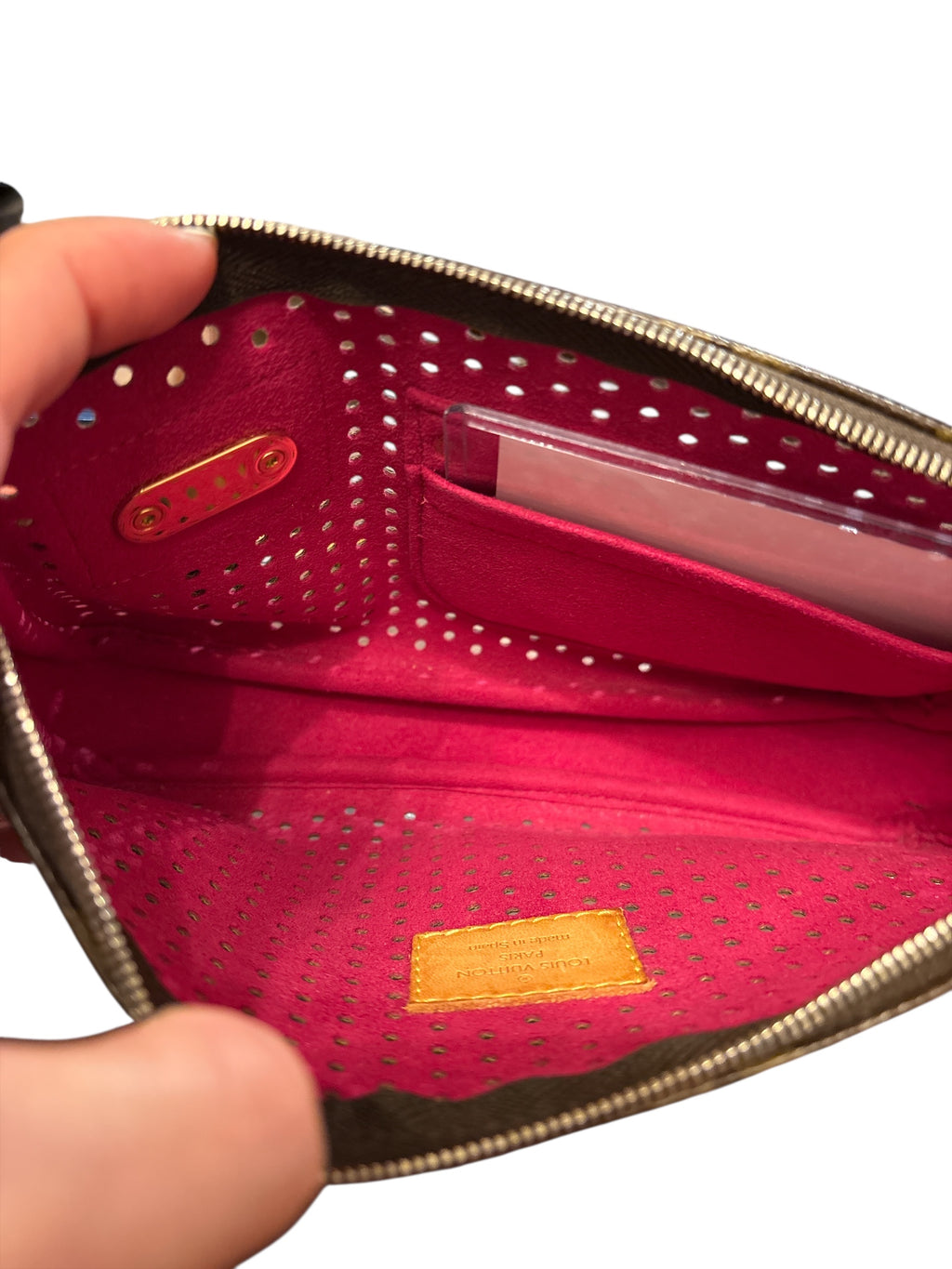 Supper Rare Grail Louis Vuitton Pochette Perforated Fuschia.