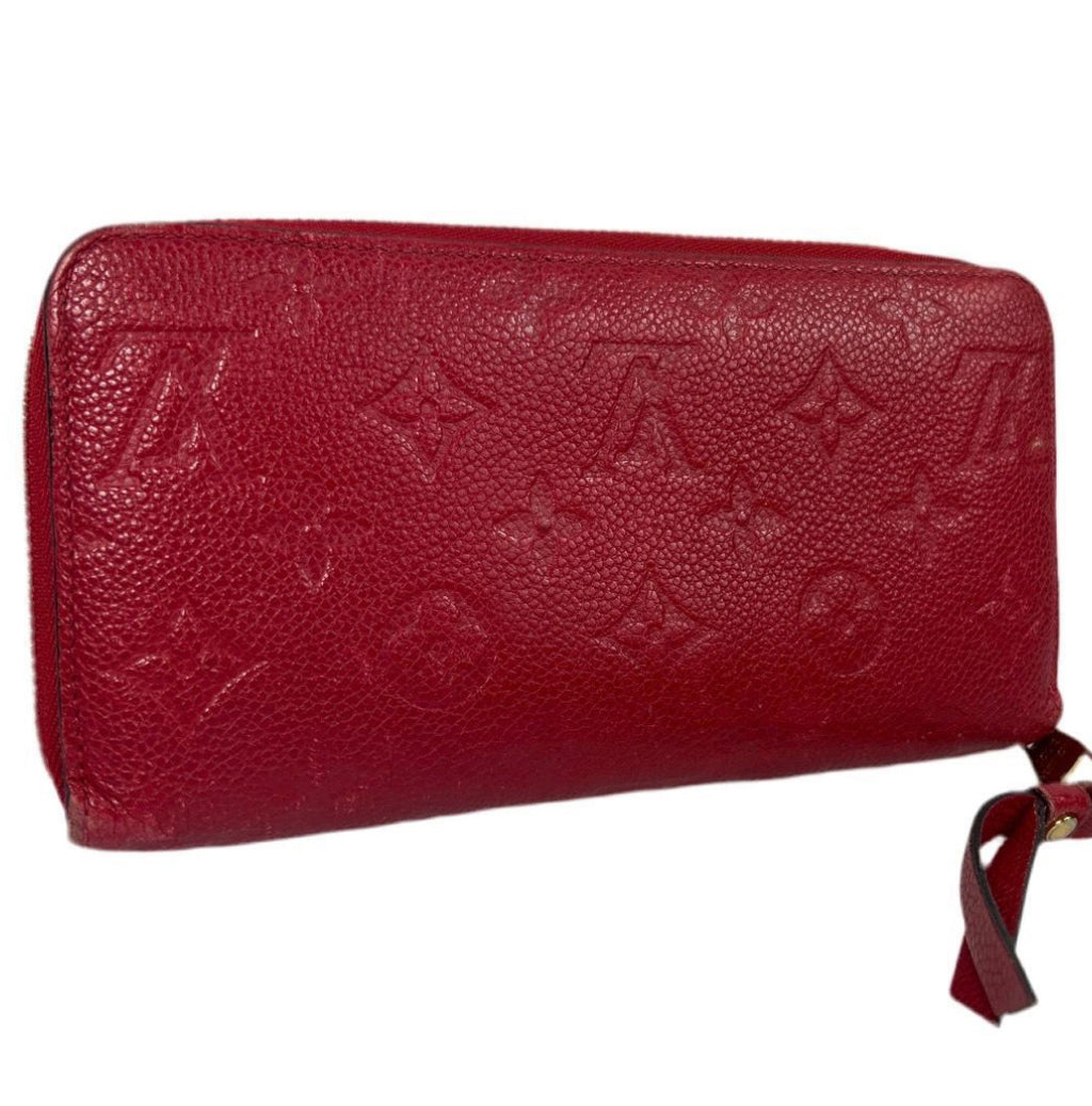 Louis Vuitton Monogram Empreinte Leather Zippy Wallet.