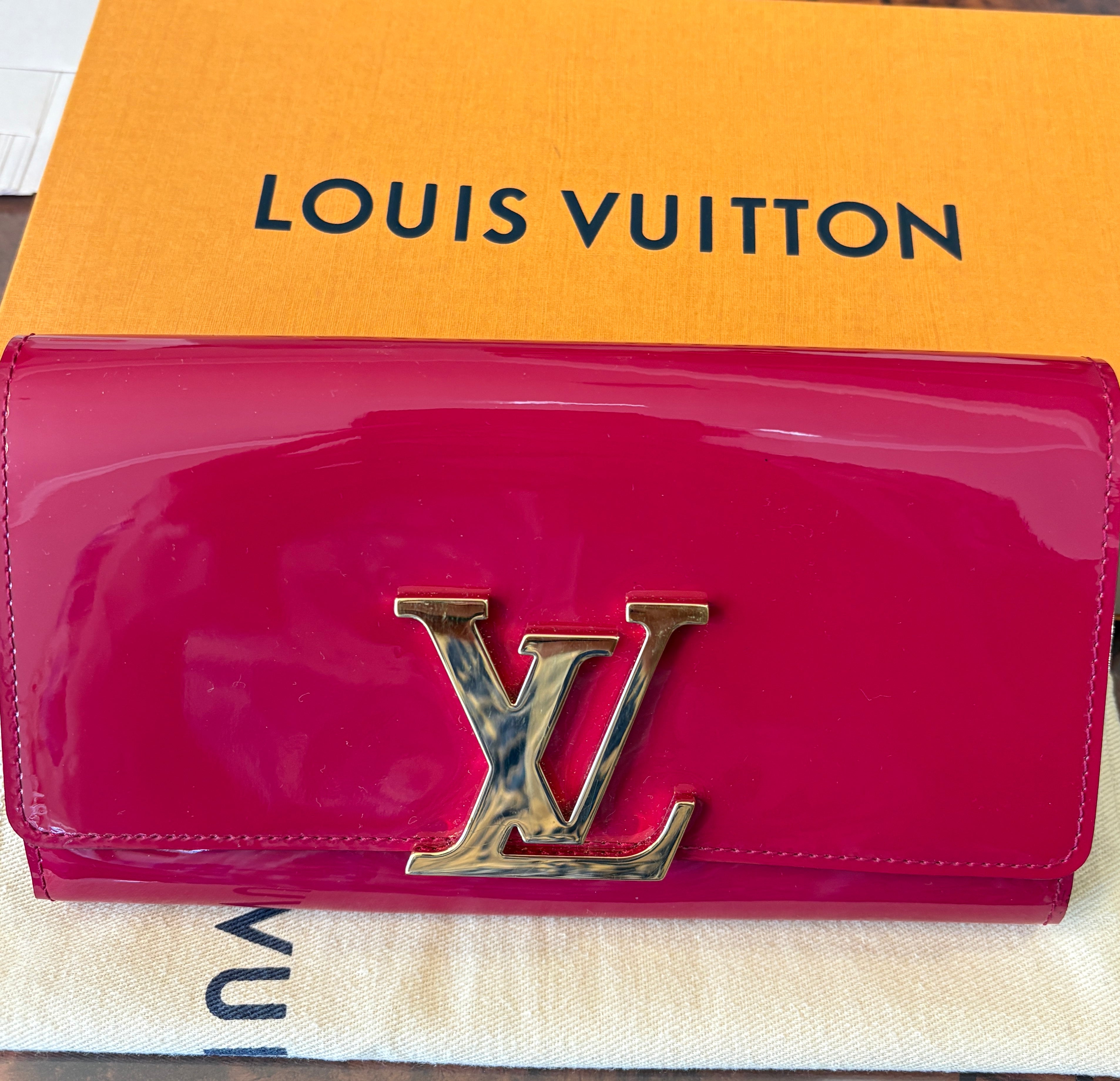 Louis Vuitton Paten Leather Clutch Bag.