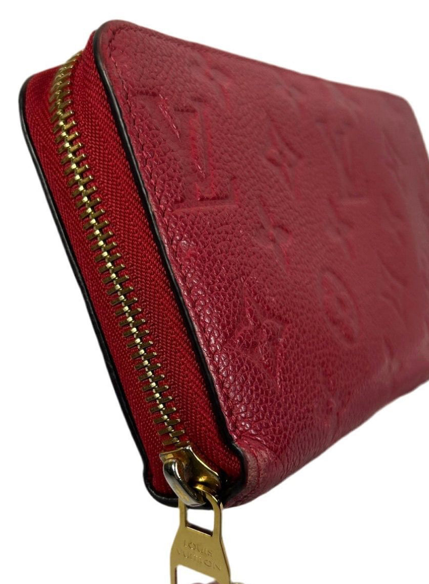 Louis Vuitton Monogram Empreinte Leather Zippy Wallet.