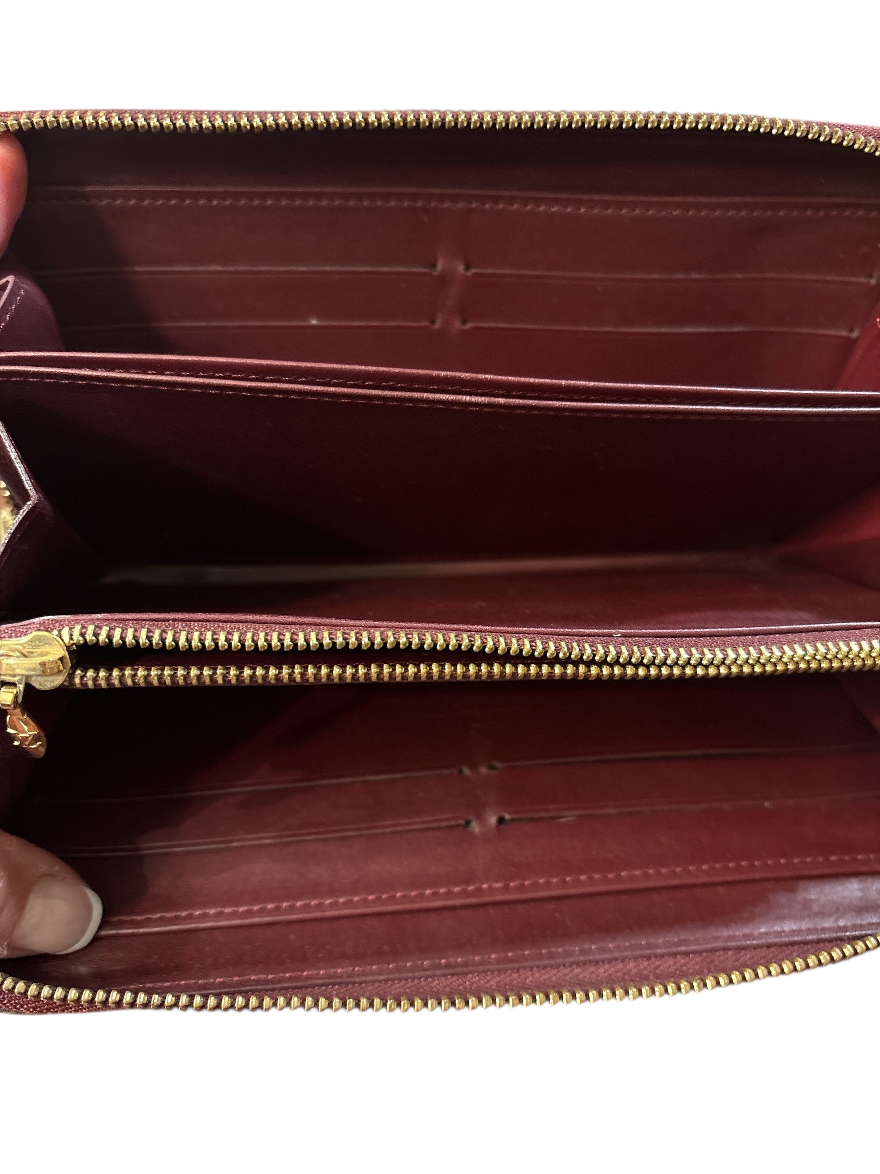 Louis Vuitton Vernis Burgundy Embossed Monogam Zipper.