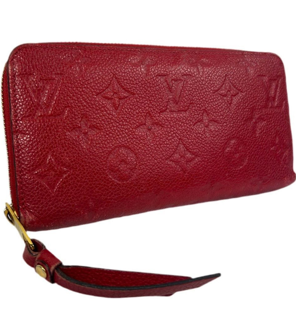Louis Vuitton Monogram Empreinte Leather Zippy Wallet.