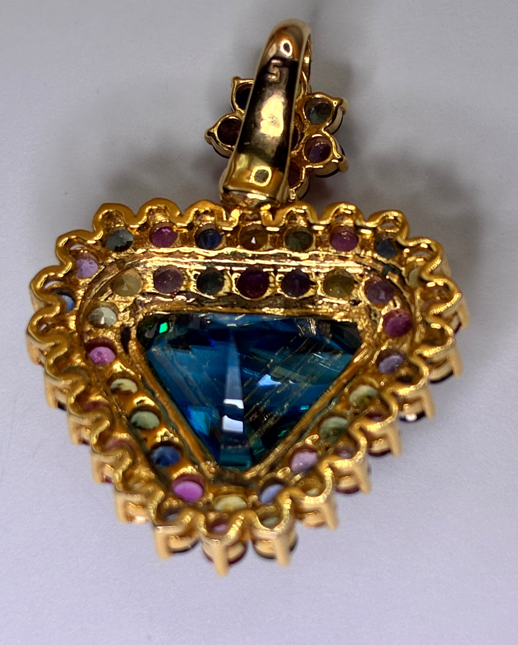 12K Gold 11.40 CT Cambodia Blue Zircon Mix With Multi Color Sapphire Pendant.