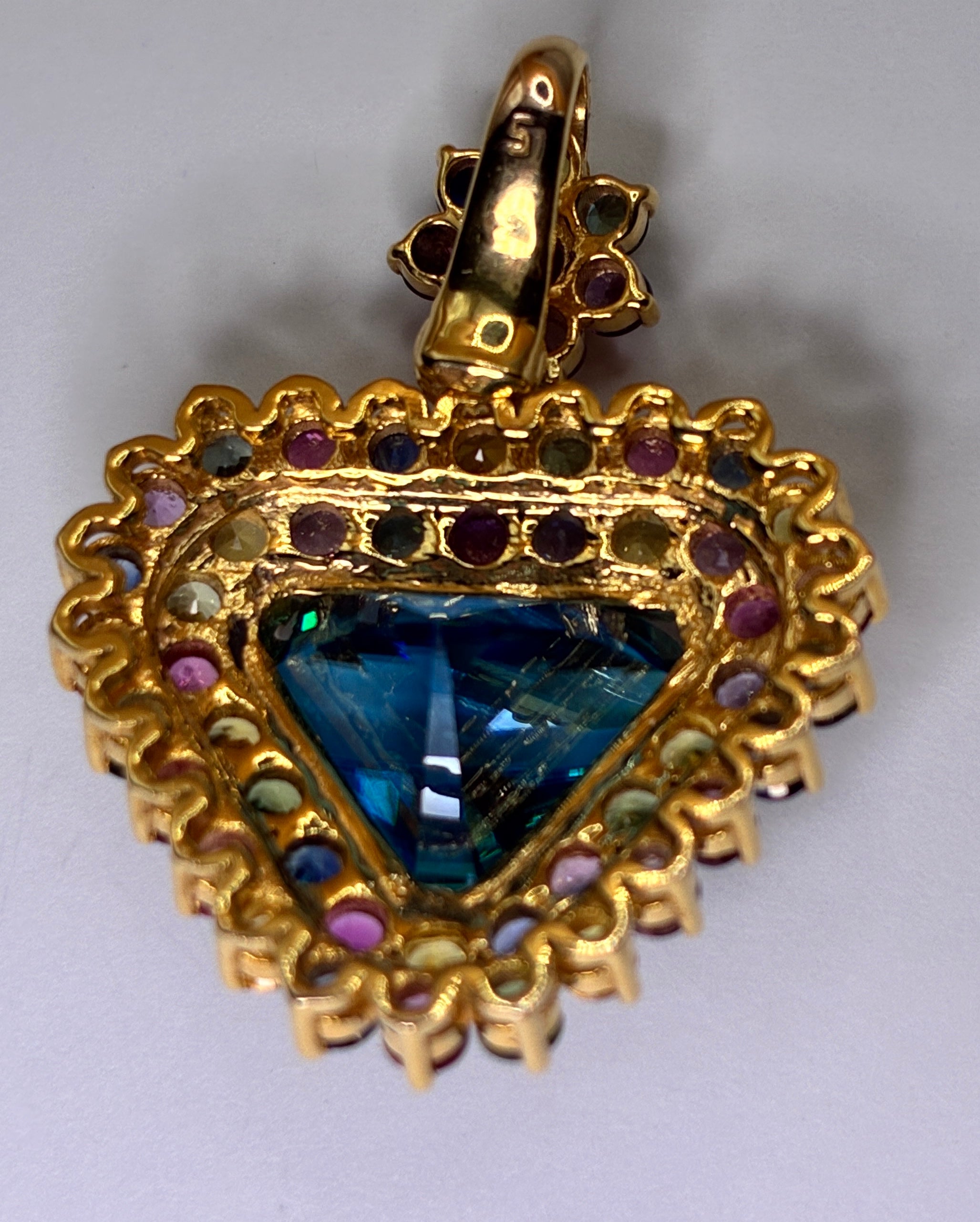 12K Gold 11.40 CT Cambodia Blue Zircon Mix With Multi Color Sapphire Pendant.