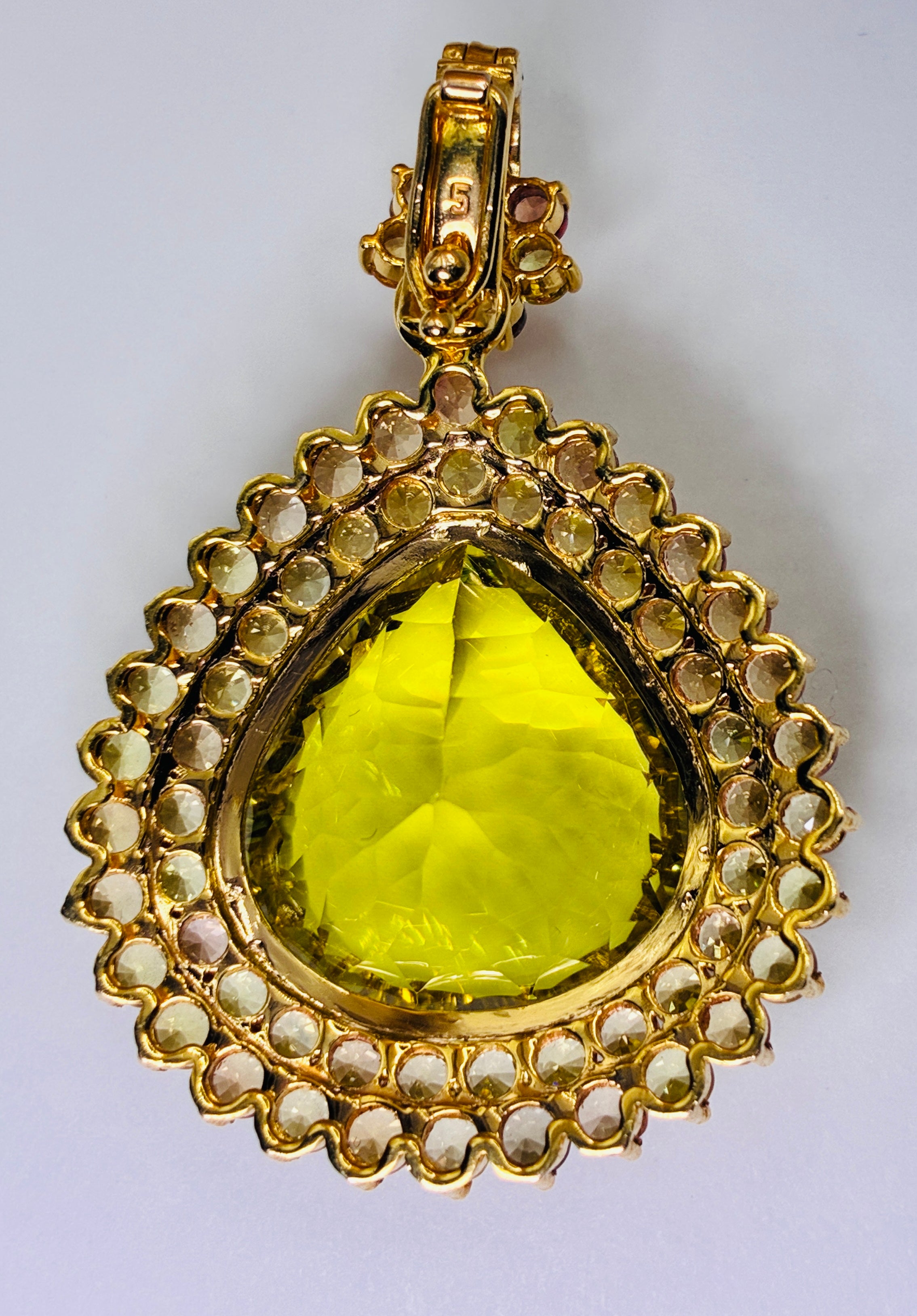 27.65CT Natural Citrine And Yellow Sapphire 12K Gold Pendant. Size 1 1/4"x1 3/4"