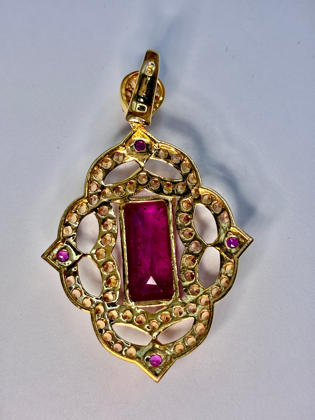 12.80 CT Africa Ruby, Cambodia Ruby And Yellow Sapphire 12K Gold Pendant.