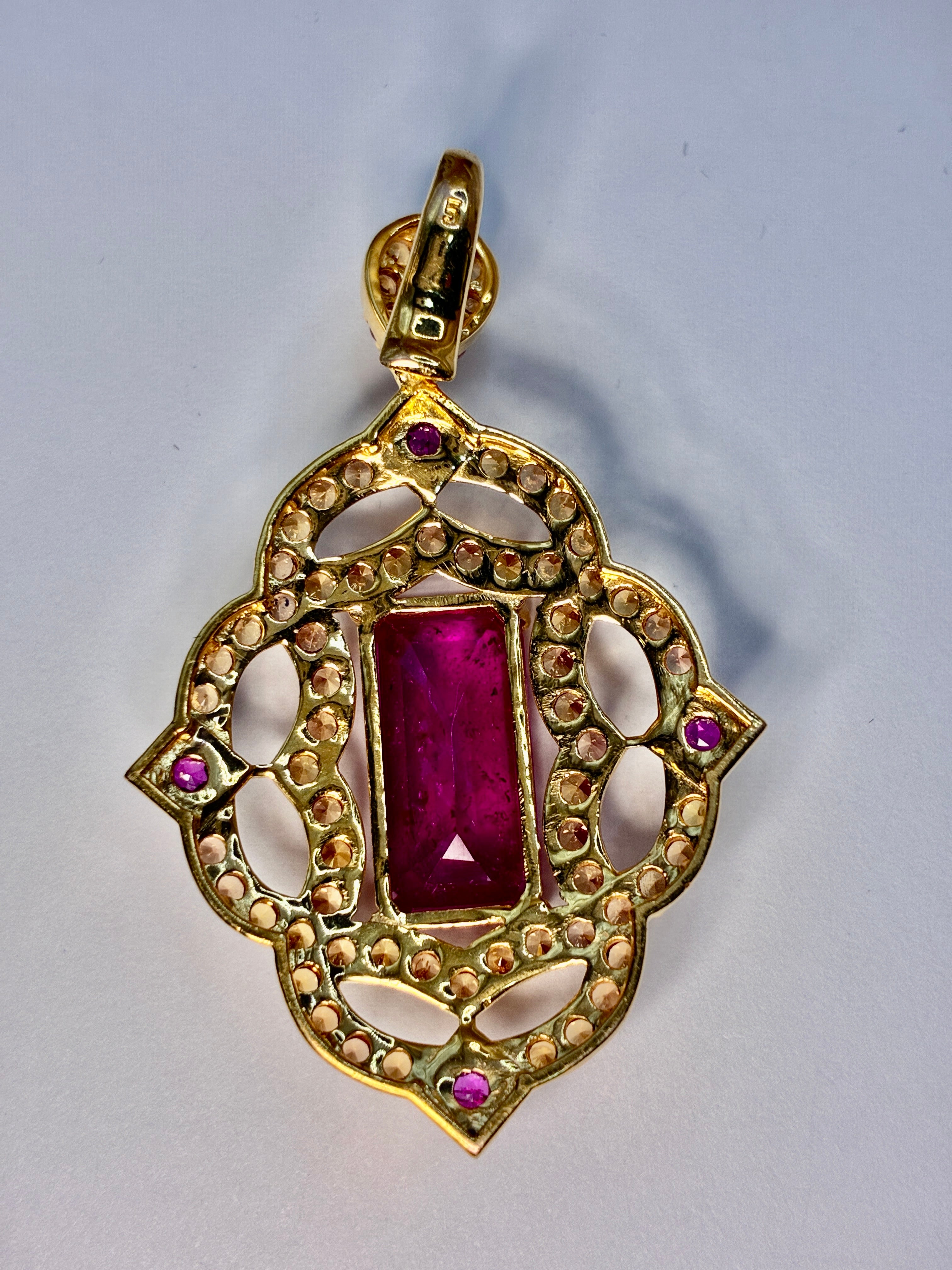 12.80 CT Africa Ruby, Cambodia Ruby And Yellow Sapphire 12K Gold Pendant.