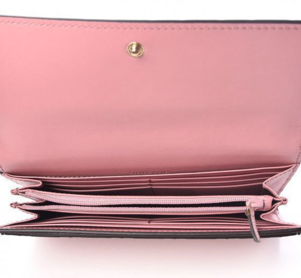 Authentic Gucci Mauve Imprint Half Flap Wallet.