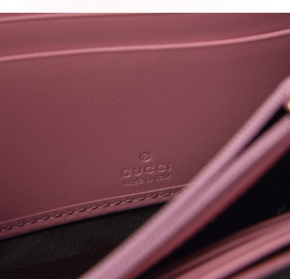 Authentic Gucci Mauve Imprint Half Flap Wallet.