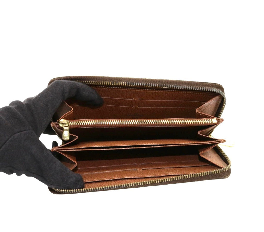 Louis Vuitton Monogram Zippy Wallet.