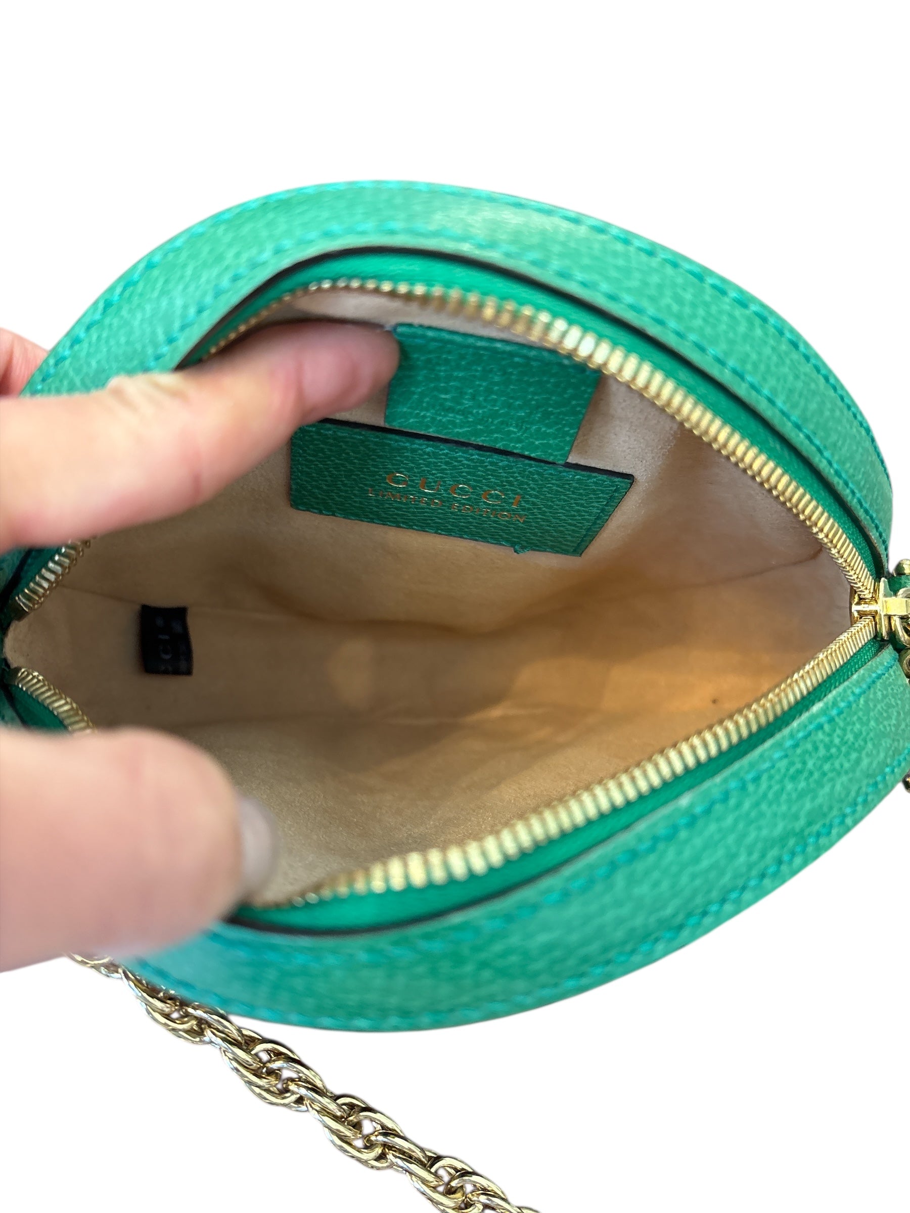 Gucci Mini GG Supreme Flora Ophidia Round Bag.